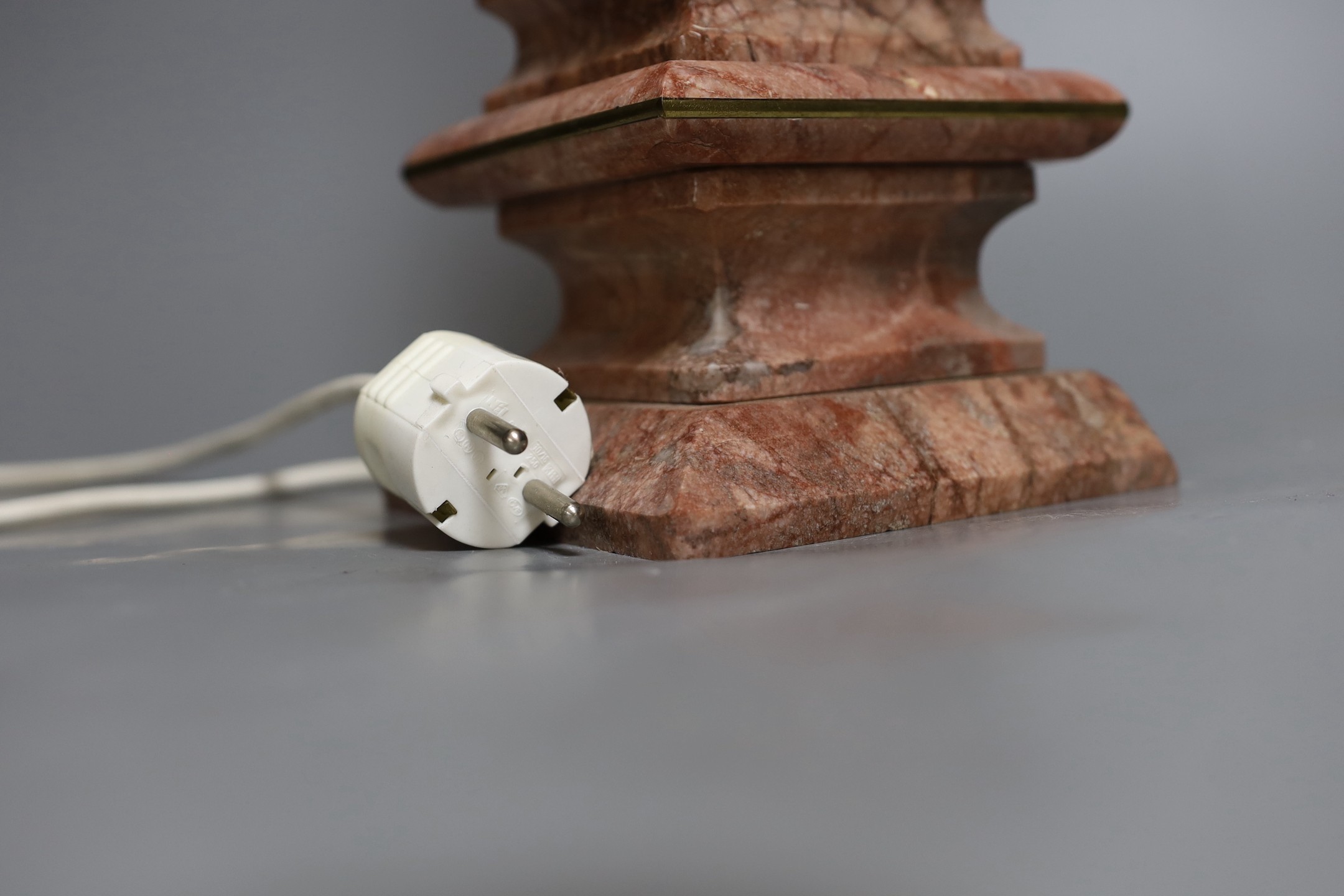 A single pink marble obelisk style desk lamp, 49cm tall